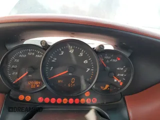 2000 Porsche Boxster z VIN WP0CA2988YU627807, wystawiony jako Copart lot #45522955 z przebiegiem 120 384 mil mil oraz Szkody całkowita. Historia ofert i sprzedaży dostępna na DreamBid. Obrazek 9.