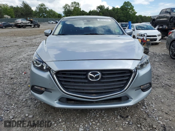 2018 Mazda 3 Touring z VIN 3MZBN1L30JM164074, wystawiony jako Copart lot #56741745 z przebiegiem 86 812 mil mil oraz Szkoda całkowita • Salvage title. Historia ofert i sprzedaży dostępna na DreamBid. Obrazek 5.