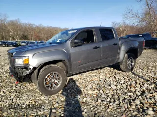 2021 GMC Canyon 4WD AT4 w/Cloth with VIN 1GTG6FEN0M1236099, listed as a Copart auction lot 80911974 with 122,672 mi miles and Salvage Title. Bid and sale history available at carsss.com. Image 1.