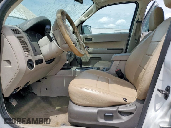 2011 Ford Escape XLT z VIN 1FMCU9D77BKB26159, wystawiony jako Copart lot #59211745 z przebiegiem 252 374 mil mil oraz Szkoda całkowita • Salvage title. Historia ofert i sprzedaży dostępna na DreamBid. Obrazek 7.