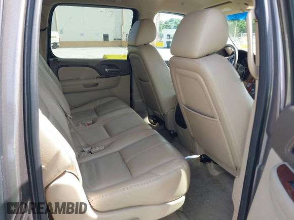 2012 Chevrolet Suburban LT with VIN 1GNSKJE72CR130111, listed as a IAAI auction lot 42699365 with 216,827 mi miles and . Bid and sale history available at DreamBid. Image 8.