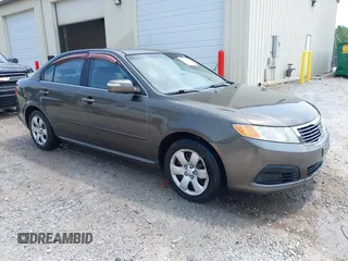 2009 Kia Optima LX z VIN KNAGE228795332156, wystawiony jako IAAI lot #42422219 z przebiegiem 146 132 mil mil oraz . Historia ofert i sprzedaży dostępna na DreamBid. Obrazek 1.