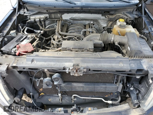 2014 Ford F-150 XL with VIN 1FTFW1EF4EKD49721, listed as a Copart auction lot 61695615 with 217,493 mi miles and Salvage title. Bid and sale history available at DreamBid. Image 11.