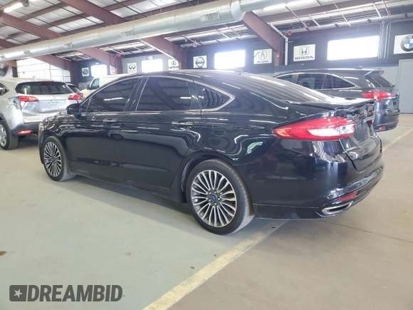 2017 Ford Fusion Titanium z VIN 3FA6P0K96HR124759, wystawiony jako Copart lot #61414395 z przebiegiem 175 655 mil mil oraz Czysty tytuł • Clean title. Historia ofert i sprzedaży dostępna na DreamBid. Obrazek 2.