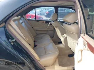 1997 Mercedes-Benz E-Class with VIN WDBJF55F7VJ027080, listed as a IAAI auction lot 42120838 with 150,197 mi miles. Bid and sale history available at carsss.com. Image 8.