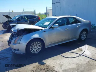 2012 Cadillac CTS with VIN 1G6DC5E55C0133032, listed as a IAAI auction lot 42189802 with 196,482 mi miles and . Bid and sale history available at DreamBid. Image 2.