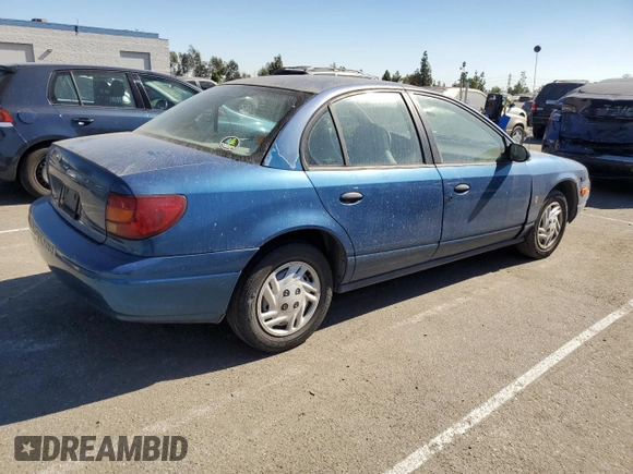 2001 Saturn SL z VIN 1G8ZF52861Z275529, wystawiony jako Copart lot #74153154 z przebiegiem 171 272 mil mil oraz Tytuł czysty. Historia ofert i sprzedaży dostępna na DreamBid. Obrazek 3.