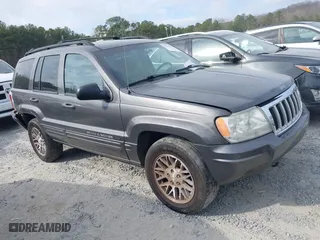 2004 Jeep Grand Cherokee Limited with VIN 1J8GW58N14C391912, listed as a IAAI auction lot 41706729 with 248,806 mi miles. Bid and sale history available at carsss.com. Image 1.
