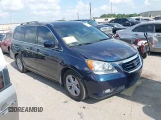 2010 Honda Odyssey Touring with VIN 5FNRL3H91AB063937, listed as a IAAI auction lot 42335142 with 143,523 mi miles and . Bid and sale history available at DreamBid. Image 1.