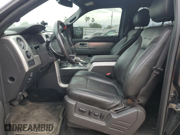 2014 Ford F-150 SVT Raptor with VIN 1FTFW1R60EFA82287, listed as a Copart auction lot 52150635 with 157,556 mi miles and Salvage Title. Bid and sale history available at carsss.com. Image 7.
