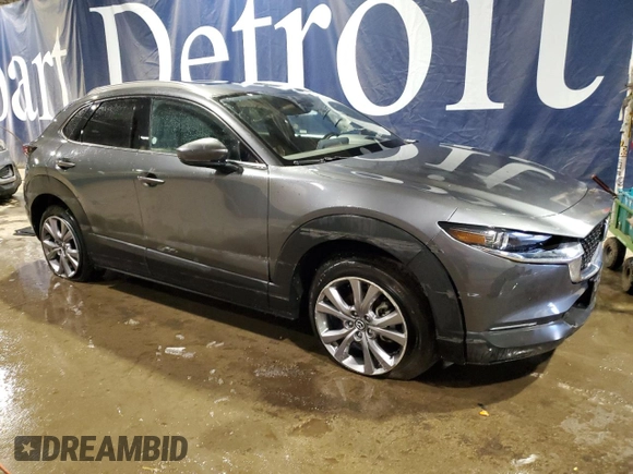 2023 Mazda CX-30 S Premium with VIN 3MVDMBDM4PM526295, listed as a Copart auction lot 88983565 with 54,991 mi miles and Non Repairable. Bid and sale history available at carsss.com. Image 4.