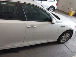 2016 Kia Optima LX with VIN KNAGT4L39G5074319, listed as a IAAI auction lot 41827438 with 51,373 mi miles. Bid and sale history available at carsss.com. Image 13.