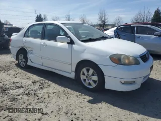 2005 Toyota Corolla CE with VIN 1NXBR32E25Z463861, listed as a Copart auction lot 50050125 with 218,974 mi miles and Salvage Title. Bid and sale history available at DreamBid. Image 4.
