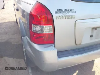 2006 Hyundai Tucson GL with VIN KM8JM12B26U469326, listed as a IAAI auction lot 42204742 with 240,998 mi miles. Bid and sale history available at carsss.com. Image 6.