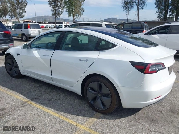 2018 Tesla Model 3 Long Range Battery with VIN 5YJ3E1EA8JF162130, listed as a IAAI auction lot 41933015 with 50,081 mi miles. Bid and sale history available at carsss.com. Image 3.