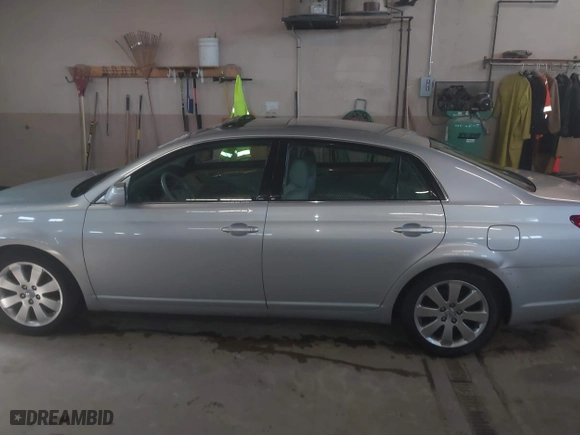 2005 Toyota Avalon XL with VIN 4T1BK36BX5U045813, listed as a IAAI auction lot 42061631 with 150,436 mi miles. Bid and sale history available at carsss.com. Image 14.