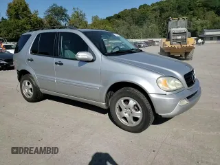 2002 Mercedes-Benz M-Class with VIN 4JGAB54E52A337189, listed as a Copart auction lot 71348154 with 220,378 mi miles and Salvage Title. Bid and sale history available at carsss.com. Image 12.