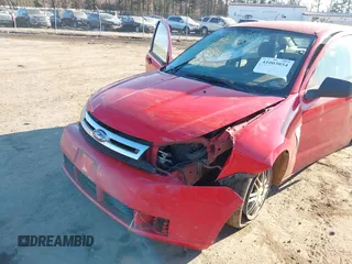 2008 Ford Focus SE with VIN 1FAHP35N18W272267, listed as a IAAI auction lot 41003854 with 239,062 mi miles. Bid and sale history available at carsss.com. Image 6.