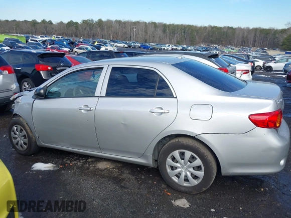 2009 Toyota Corolla with VIN JTDBL40E899083155, listed as a IAAI auction lot 41056942 with 294,132 mi miles. Bid and sale history available at carsss.com. Image 14.