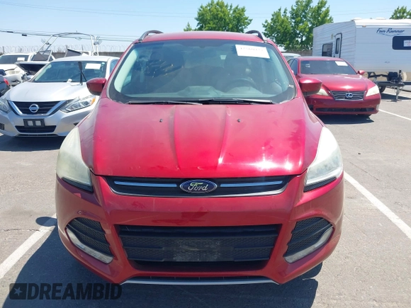2014 Ford Escape SE z VIN 1FMCU9GX3EUB64623, wystawiony jako IAAI lot #42560923 z przebiegiem 120 730 mil mil oraz . Historia ofert i sprzedaży dostępna na DreamBid. Obrazek 6.