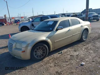2010 Chrysler 300 Touring with VIN 2C3CA5CV0AH167992, listed as a IAAI auction lot 41985352 with 235,816 mi miles. Bid and sale history available at carsss.com. Image 2.