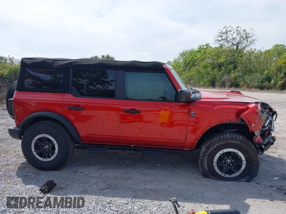 2023 Ford Bronco with VIN 1FMEE5DP7PLC06447, listed as a IAAI auction lot 41881411 with 6,842 mi miles. Bid and sale history available at carsss.com. Image 13.
