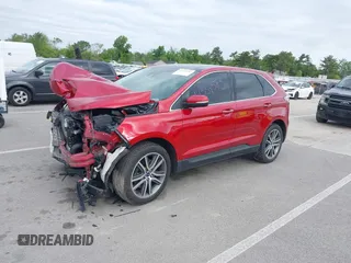 2021 Ford Edge Titanium z VIN 2FMPK4K91MBA16896, wystawiony jako IAAI lot #42334583 z przebiegiem 37 508 mil mil oraz . Historia ofert i sprzedaży dostępna na DreamBid. Obrazek 2.