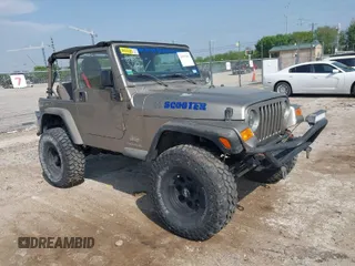 2005 Jeep Wrangler SE with VIN 1J4FA29S25P328827, listed as a IAAI auction lot 41917807 with 157,562 mi miles. Bid and sale history available at carsss.com. Image 1.