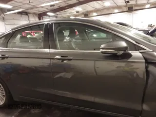 2015 Ford Fusion SE with VIN 3FA6P0H96FR293510, listed as a IAAI auction lot 41897900 with 76,744 mi miles and . Bid and sale history available at carsss.com. Image 14.
