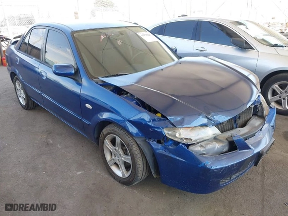 2003 Mazda Protege LX with VIN JM1BJ226X30189831, listed as a IAAI auction lot 41970226 with 77,976 mi miles. Bid and sale history available at carsss.com. Image 1.