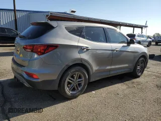 2018 Hyundai Santa Fe 2.4L с VIN 5XYZTDLB1JG542982, выставлен на аукционе Copart как лот 55081465 с пробегом 86 862 миль миль и Списание • Salvage title. История ставок и продаж доступна на DreamBid. Изображение 3.