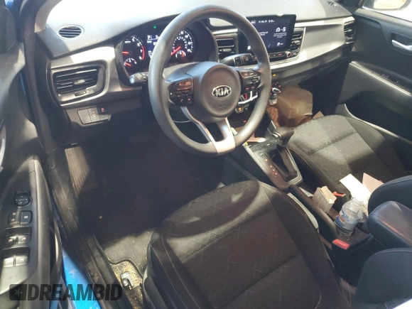 2021 Kia Rio S with VIN 3KPA24ADXME422202, listed as a Copart auction lot 85538434 with 99,138 mi miles and Salvage Title. Bid and sale history available at DreamBid. Image 8.