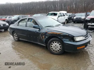 1996 Honda Accord EX with VIN 1HGCD565XTA276994, listed as a Copart auction lot 44344115 with 221,926 mi miles and Salvage Title. Bid and sale history available at DreamBid. Image 4.