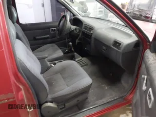 1997 Nissan Frontier XE with VIN 1N6SD16SXVC362299, listed as a IAAI auction lot 41941202 with 244,729 mi miles and . Bid and sale history available at DreamBid. Image 5.