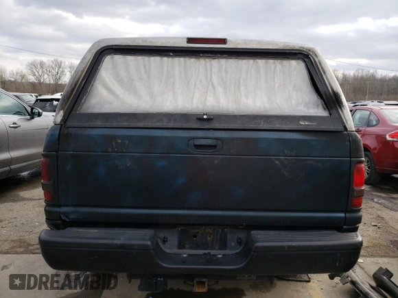 1998 Dodge 2500 z VIN 1B7KC23W1WJ160340, wystawiony jako Copart lot #88930925 z przebiegiem Nie podano mil oraz Szkoda całkowita • Salvage title. Historia ofert i sprzedaży dostępna na DreamBid. Obrazek 6.