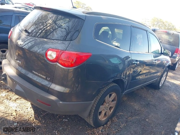 2011 Chevrolet Traverse LT w/1LT with VIN 1GNKRGED4BJ166772, listed as a IAAI auction lot 41648847 with 205,090 mi miles. Bid and sale history available at carsss.com. Image 4.