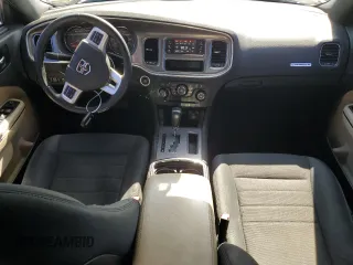 2013 Dodge Charger SE with VIN 2C3CDXBG8DH677551, listed as a Copart auction lot 53260735 with 124,248 mi miles and Salvage Title. Bid and sale history available at DreamBid. Image 8.