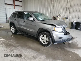 2013 Jeep Grand Cherokee Laredo with VIN 1C4RJFAG3DC612250, listed as a Copart auction lot 53155455 with 157,895 mi miles and Salvage Title. Bid and sale history available at carsss.com. Image 4.