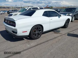 2015 Dodge Challenger SXT Plus with VIN 2C3CDZBG3FH913585, listed as a IAAI auction lot 42609599 with 85,524 mi miles and . Bid and sale history available at DreamBid. Image 4.