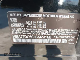 2018 BMW 7 Series 750i with VIN WBA7F0C50JGM24160, listed as a IAAI auction lot 41448519 with 138,742 mi miles. Bid and sale history available at carsss.com. Image 9.