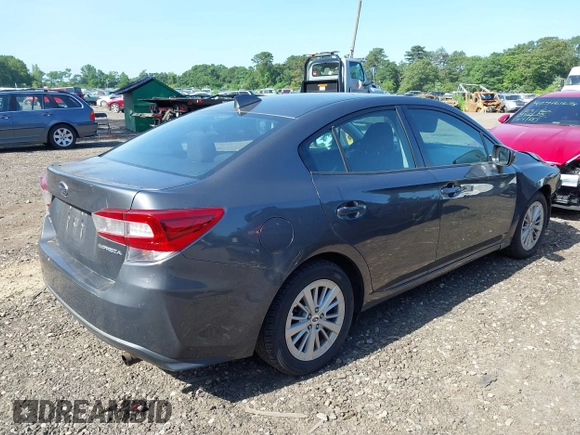 2018 Subaru Impreza Premium with VIN 4S3GKAB68J3600376, listed as a IAAI auction lot 42537703 with 126,846 mi miles and . Bid and sale history available at DreamBid. Image 4.