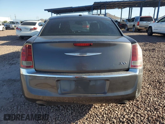 2014 Chrysler 300 z VIN 2C3CCAAG7EH255371, wystawiony jako Copart lot #54427245 z przebiegiem 166 049 mil mil oraz Szkoda całkowita • Salvage title. Historia ofert i sprzedaży dostępna na DreamBid. Obrazek 6.