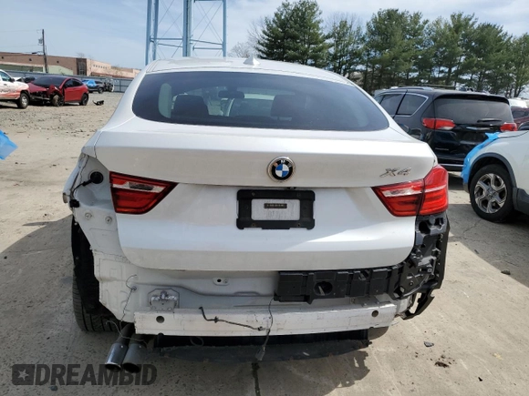 2015 BMW X4 xDrive28i with VIN 5UXXW3C59F0F89517, listed as a Copart auction lot 49989304 with 65,554 mi miles. Bid and sale history available at carsss.com. Image 6.