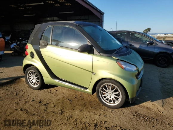 2012 Smart fortwo Pure z VIN WMEEJ3BA7CK543415, wystawiony jako Copart lot #42707385 z przebiegiem 76 280 mil mil oraz Szkody całkowita. Historia ofert i sprzedaży dostępna na DreamBid. Obrazek 4.