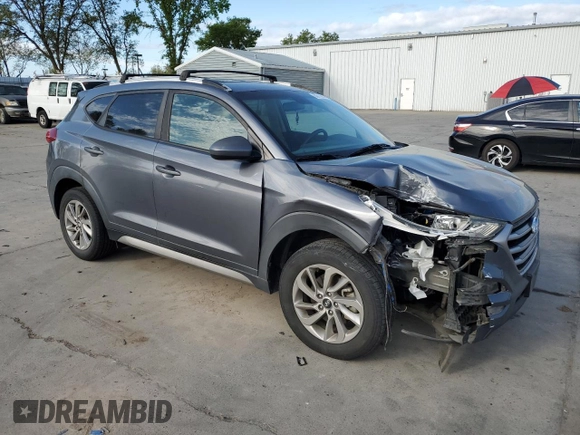 2017 Hyundai Tucson SE with VIN KM8J33A40HU330073, listed as a Copart auction lot 50713935 with 135,673 mi miles and Salvage Title. Bid and sale history available at DreamBid. Image 4.