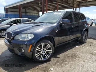 2012 BMW X5 35i с VIN 5UXZV4C50CL760275, выставлен на аукционе Copart как лот 62416645 с пробегом 124 807 миль миль и Списание • Salvage title. История ставок и продаж доступна на DreamBid. Изображение 1.