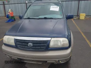 2001 Suzuki Grand Vitara JLX z VIN JS3TD62VX14165885, wystawiony jako IAAI lot #42091059 z przebiegiem 197 030 mil mil oraz . Historia ofert i sprzedaży dostępna na DreamBid. Obrazek 6.