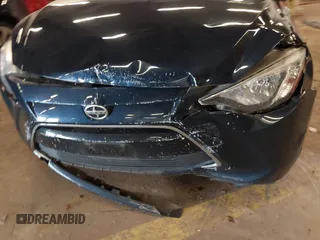2016 Scion iA z VIN 3MYDLBZV5GY103533, wystawiony jako IAAI lot #41756270 z przebiegiem 59 290 mil mil oraz . Historia ofert i sprzedaży dostępna na DreamBid. Obrazek 18.
