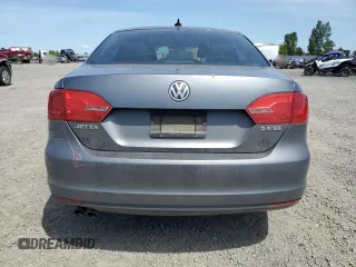 2013 Volkswagen Jetta SE with VIN 3VWDP7AJXDM281723, listed as a Copart auction lot 57235725 with 128,157 mi miles and Salvage title. Bid and sale history available at DreamBid. Image 6.