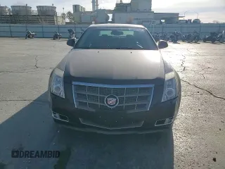 2009 Cadillac CTS AWD z VIN 1G6DS57V390110289, wystawiony jako Copart lot #49331995 z przebiegiem 146 254 mil mil oraz Szkoda całkowita • Salvage title. Historia ofert i sprzedaży dostępna na DreamBid. Obrazek 10.